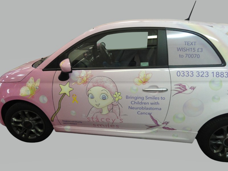 Stacey's Smiles Pink Fiat 500 yellow promotional car