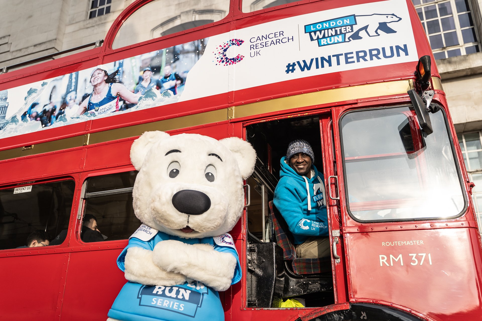 Cancer Research Winter Run red white blue Routemaster Bus