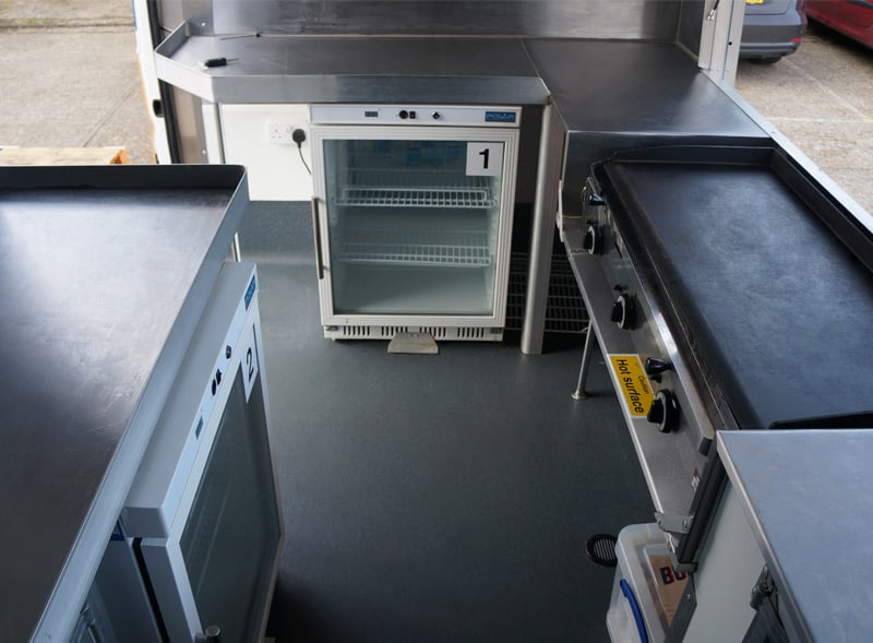 Modern Sampling van cooking appliances interior for Burger and Lobster activation