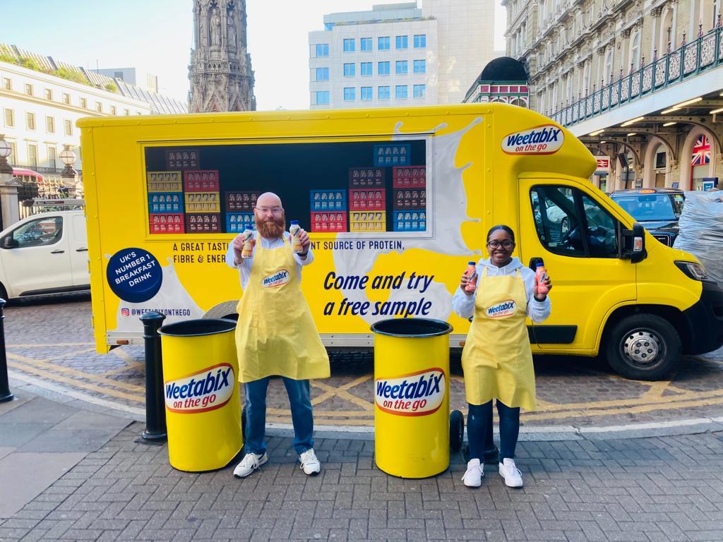 Yellow Weetabix branded Exhibition vehicle outside Charing Cross